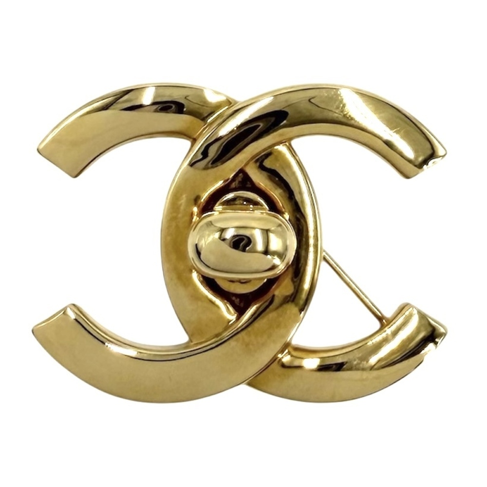 CHANEL Gold Logo Brooch